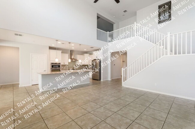 Building Photo - 5768 S Tiger Lily Pl