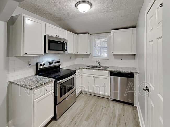 Building Photo - 219 Howell Dr SW