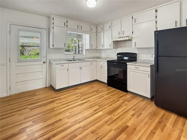 Foto del edificio - 1410 N Tropical Ave
