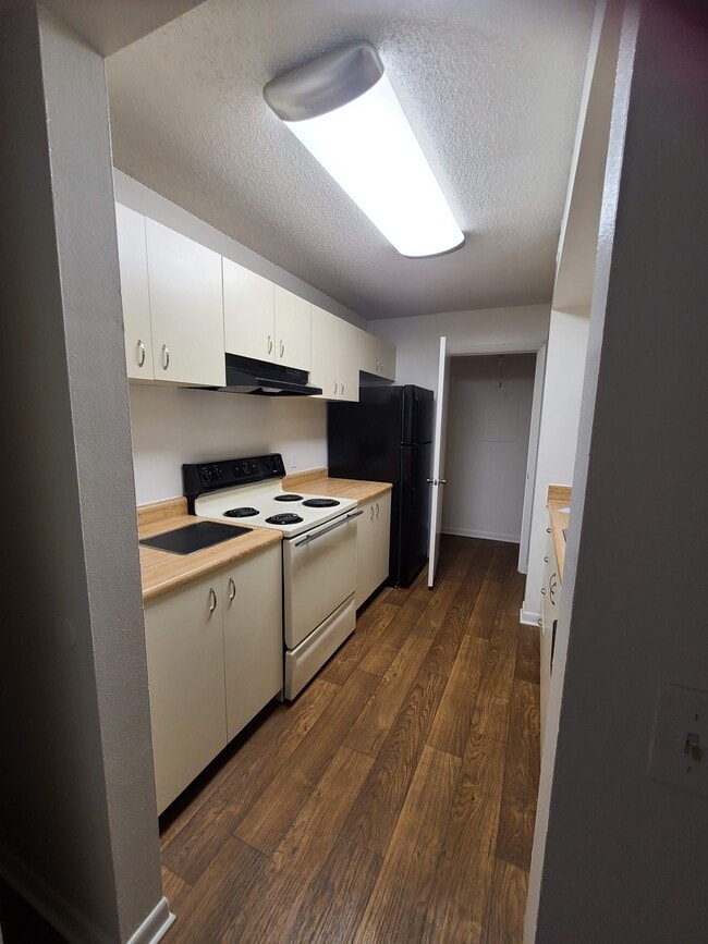 Traditional 1/1 Kitchen/Laundry room view - The Harbor