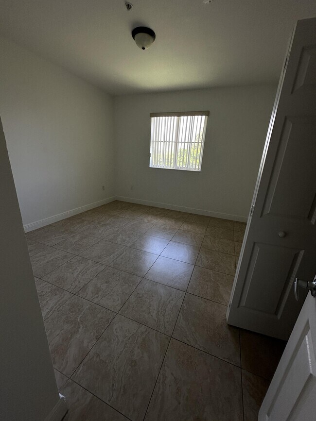 Building Photo - 18170 NW 59th Ave