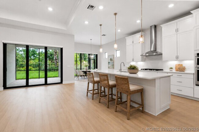 Foto del edificio - 9195 Cape Honey Bee Ln