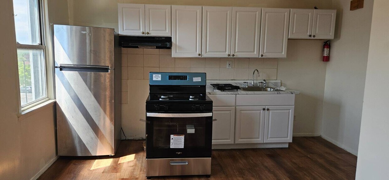 Foto principal - 31 ave 103rd St