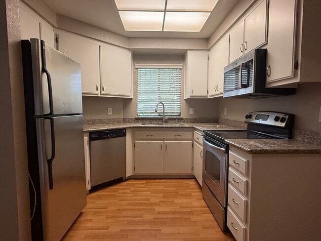 Photo - Remodeled 2 Bedroom 2 Bath Condo in Park-like Cedar Gables Community!