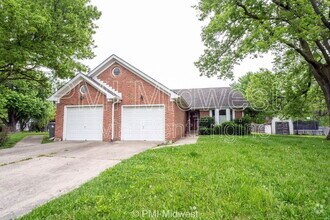 Building Photo - 406 Tulip Dr