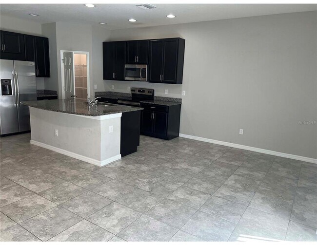 Foto del edificio - 7208 Grand Elm Dr
