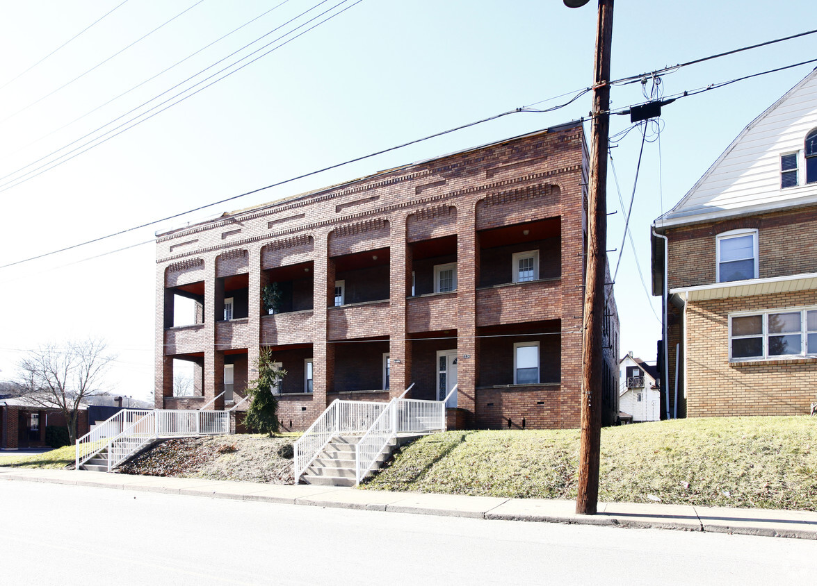 Building Photo - 1124-1130 S Mill St