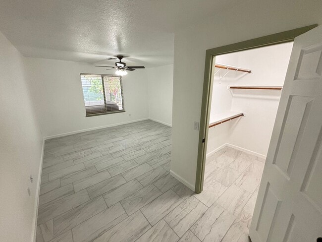 Building Photo - This inviting single-story home boasts a s...