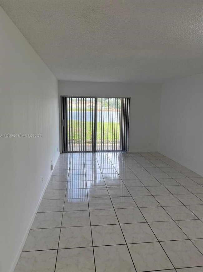 Building Photo - 8560 N Sherman Cir