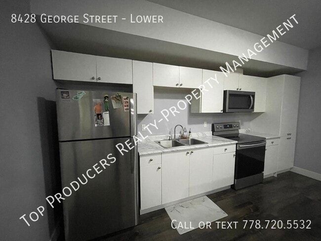Building Photo - 2 Bedroom Suite - Includes Utilities