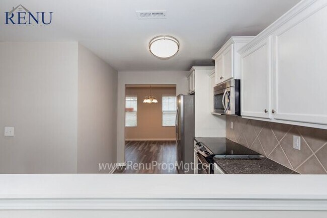Building Photo - This Summer Special is Heating Up!: 50% of...