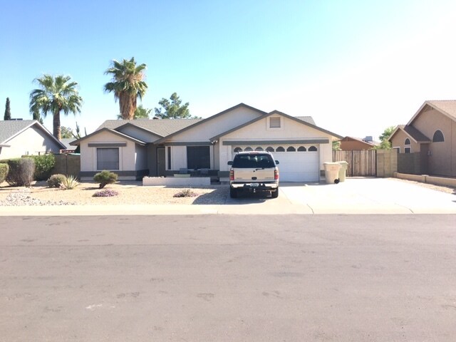 Building Photo - 8803 W Cavalier Dr