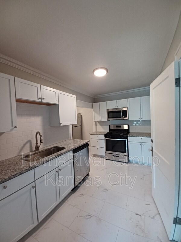 Foto del edificio - 4907 E 39th St