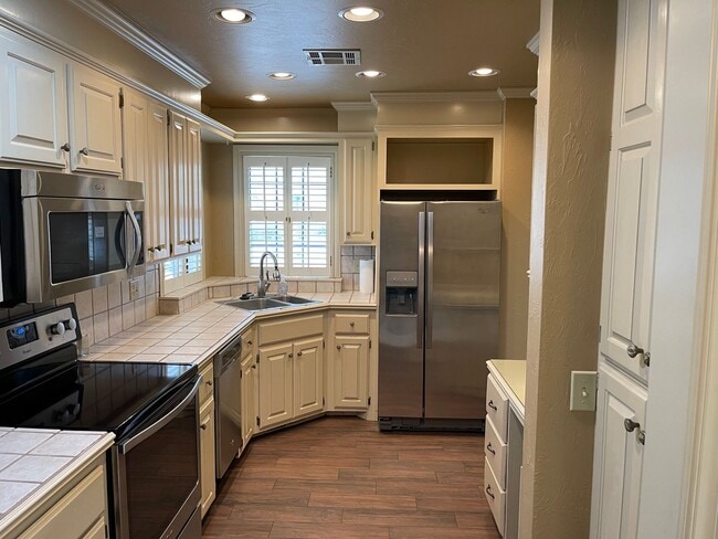 Building Photo - 55 and up community!!  2 bed flex floorplan with office, bright natural light throughout, 2 car g...