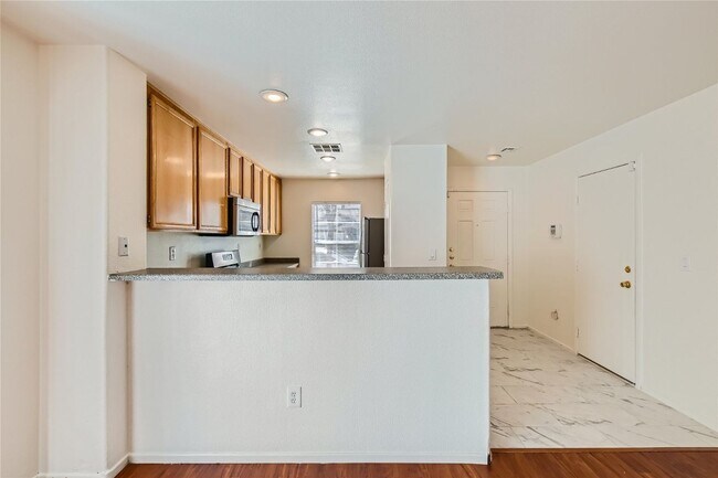 Building Photo - STYLISH Home with Fresh Updates in Gated C...