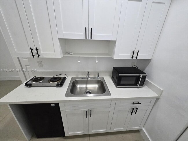 Building Photo - 931 Opa-locka Blvd