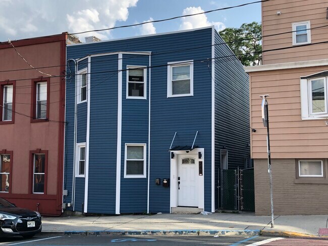 Brand new siding and windows! - 241 68TH ST