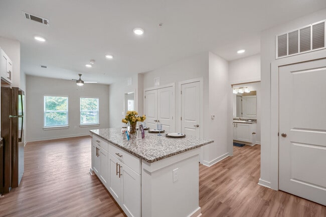 Kitchen with view of bathroom in the background - Anthem III