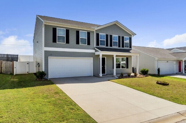 Foto del edificio - Modern 4-Bedroom Home in Butler Knoll – La...