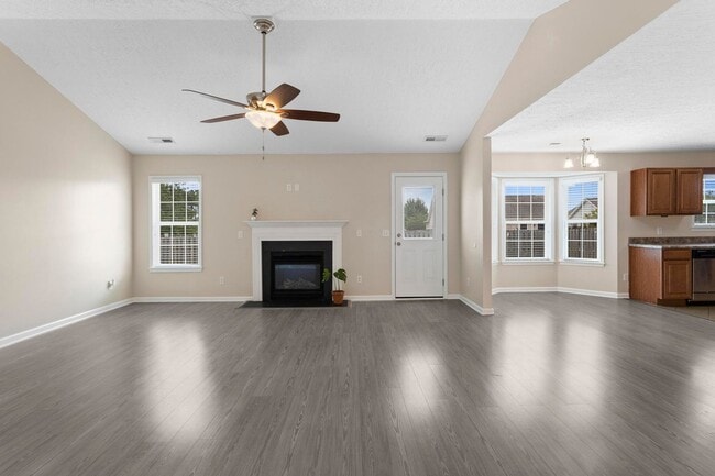 Building Photo - House with Fenced Back Yard Available!