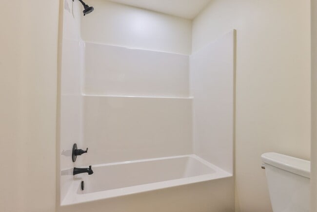 Building Photo - Modern Remodel with Designer Finishes | All Utilities Included