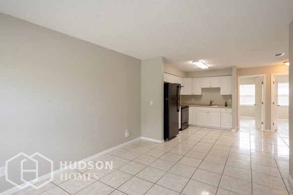 NOW AVAILABLE! 1411 E 109th Ave Unit 1, Ta... photo'