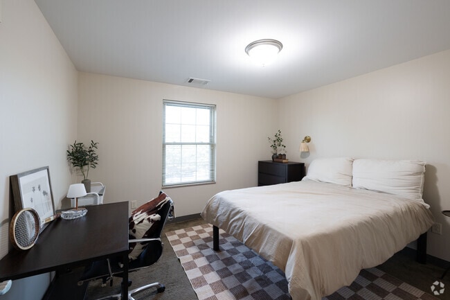 1BR, 1BA - 633SF - Bedroom - College Suites of City Station East