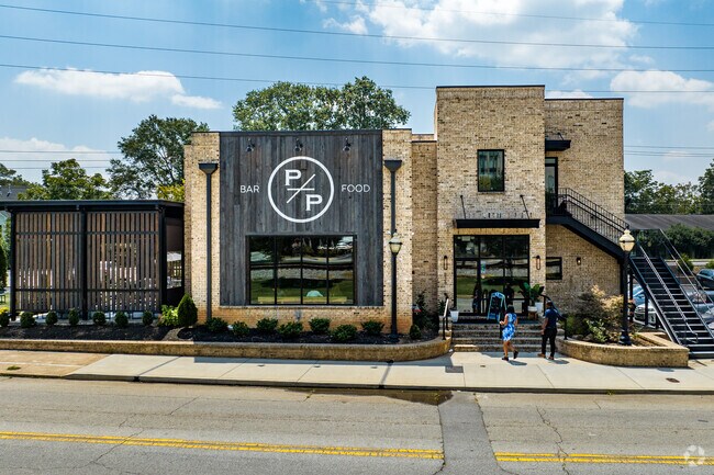Residents can grab a bite at Paper Plane, a restaurant and beer garden.