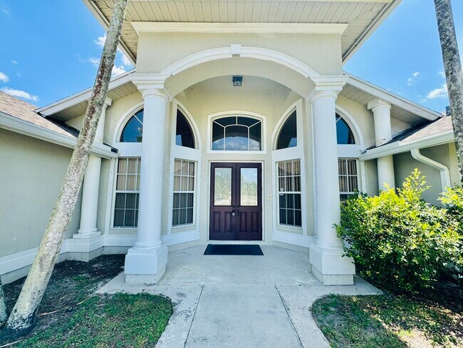 Building Photo - 6174 Royal Palm Beach Blvd