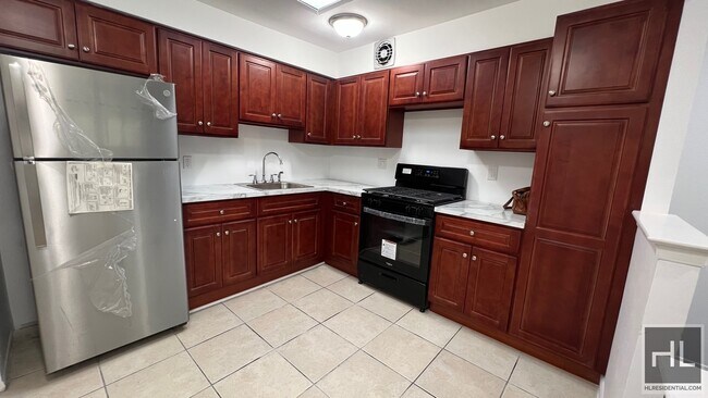 Building Photo - GUT RENOVATED VERY LARGE 3 BEDEROOMS W/ PR...