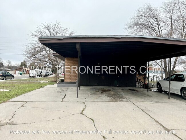 Building Photo - Charming and spacious basement unit priced...