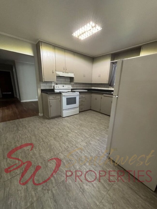Building Photo - Spacious 4 Bedroom Home with Park-Like Backyard!