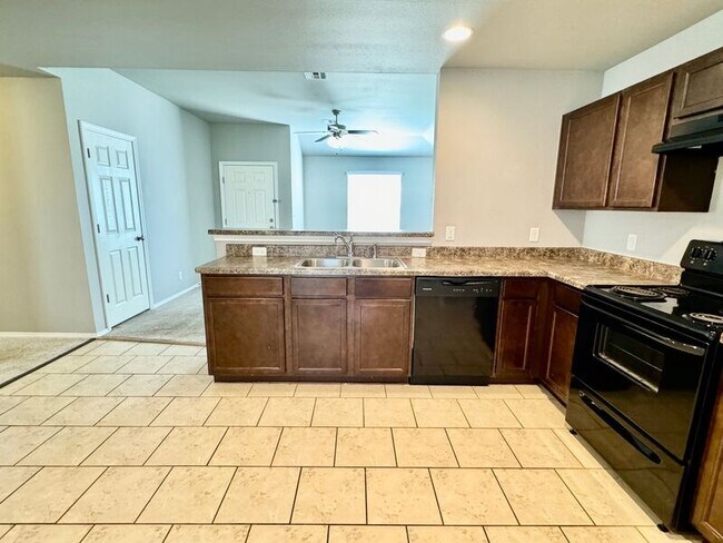 Foto del edificio - 6707 N 128th E Ave