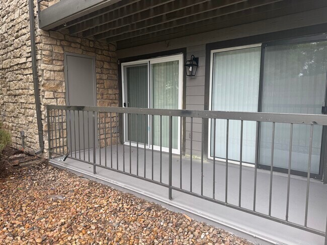 Patio with sliding door entrance to primary bedroom and living room, Also, large storage closet - 2575 S Syracuse Way