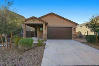 Building Photo - 40499 W Sunland Dr