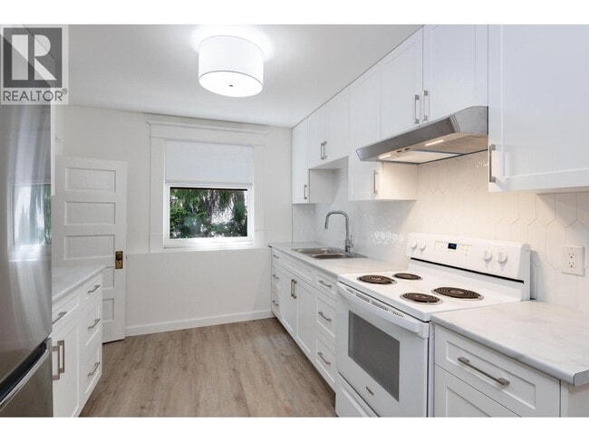 Building Photo - 2176 W 13th Ave