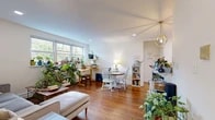 Located at 22 Cottage St in South Orange, NJ, this well-appointed one-bedroom, one-bathroom residence offers a thoughtfully organized layout across a single floor. The combined living and dining area serves as the heart of the home, featuring warm hardwood floors, recessed lighting, and large windows that invite abundant natural light and views of the surrounding greenery. A stylish geometric pendant light anchors the dining space, while the open layout provides comfortable room for both lounging and entertaining.

The kitchen is efficiently designed with white shaker cabinetry, a herringbone marble tile backsplash, a stainless steel gas range, and a butcher block island that adds both workspace and charm. The bedroom is a calm, well-lit retreat with hardwood floors, recessed lighting, and a window overlooking the outdoors.

The bathroom is notably updated, featuring large-format tile flooring, a sleek white vanity with quartz countertop, and a tub and shower combination enclosed by a sliding glass door with marble-style tile surround. Additional storage is provided by three closets and a hallway. The space also benefits from a dedicated entry area. With its clean finishes, practical layout, and natural light throughout, this residence offers a comfortable and functional living environment in a desirable New Jersey location.