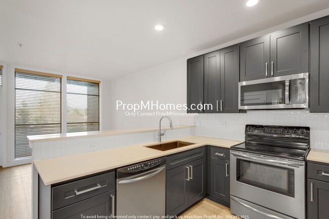Foto del edificio - Luxury One-Bedroom Condo in Downtown Gresh...