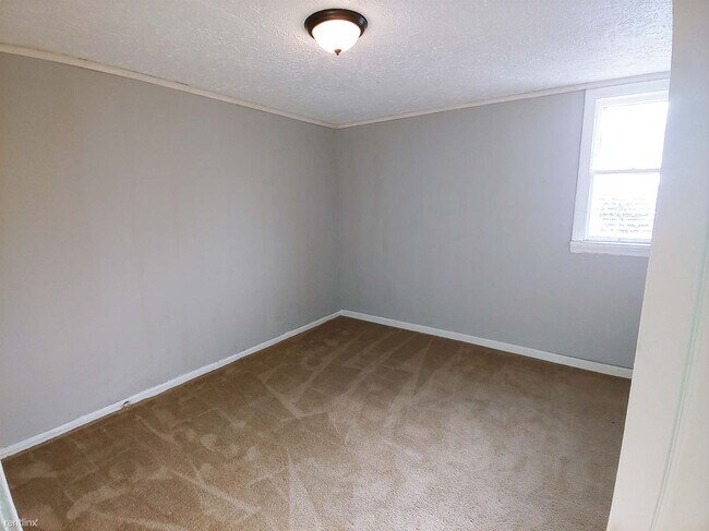 Foto del edificio - 3 br, 1 bath Triplex - 1414 East 110th Str...