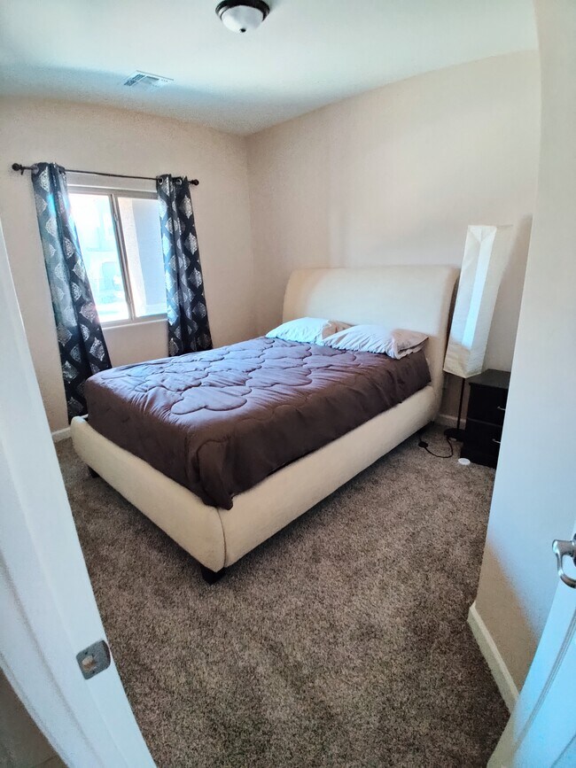 Dormitorio 1 en la planta baja - 12071 E Becker Dr