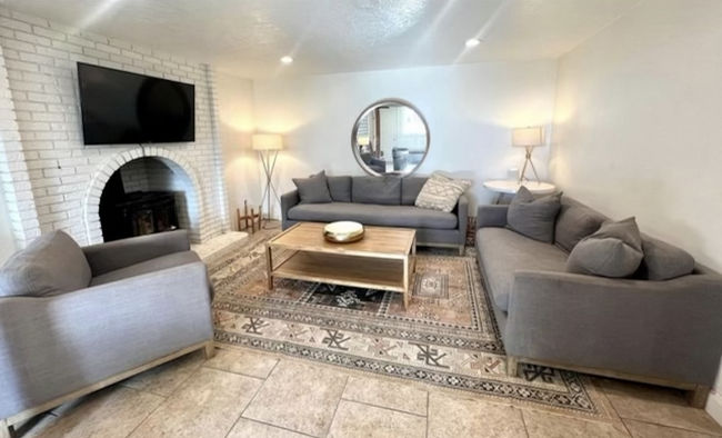 Living room with wood burning stove - 2686 W 1800 S