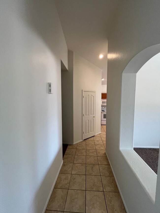 Building Photo - 4 Bedroom, 2 Bath with new Interior paint ...