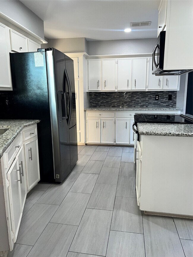 Foto del edificio - 12419 Windy Wisp Ln