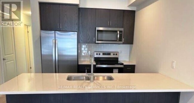 Photo du bâtiment - 405-405 Myers Rd