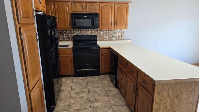 Building Photo - Huge 3 Bedroom Twin Home with 2 Stall Garage