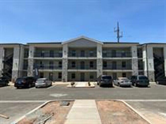 Building Photo - Red Vista Condos!