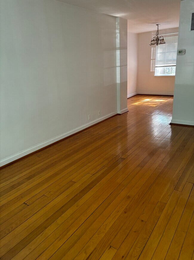 Living room to dining room - 3441 S Stafford St