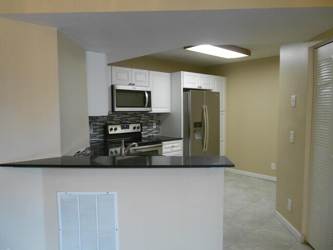 Building Photo - 8977 Wiles Rd