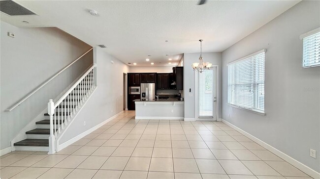 Building Photo - 8348 Tavistock Lakes Blvd