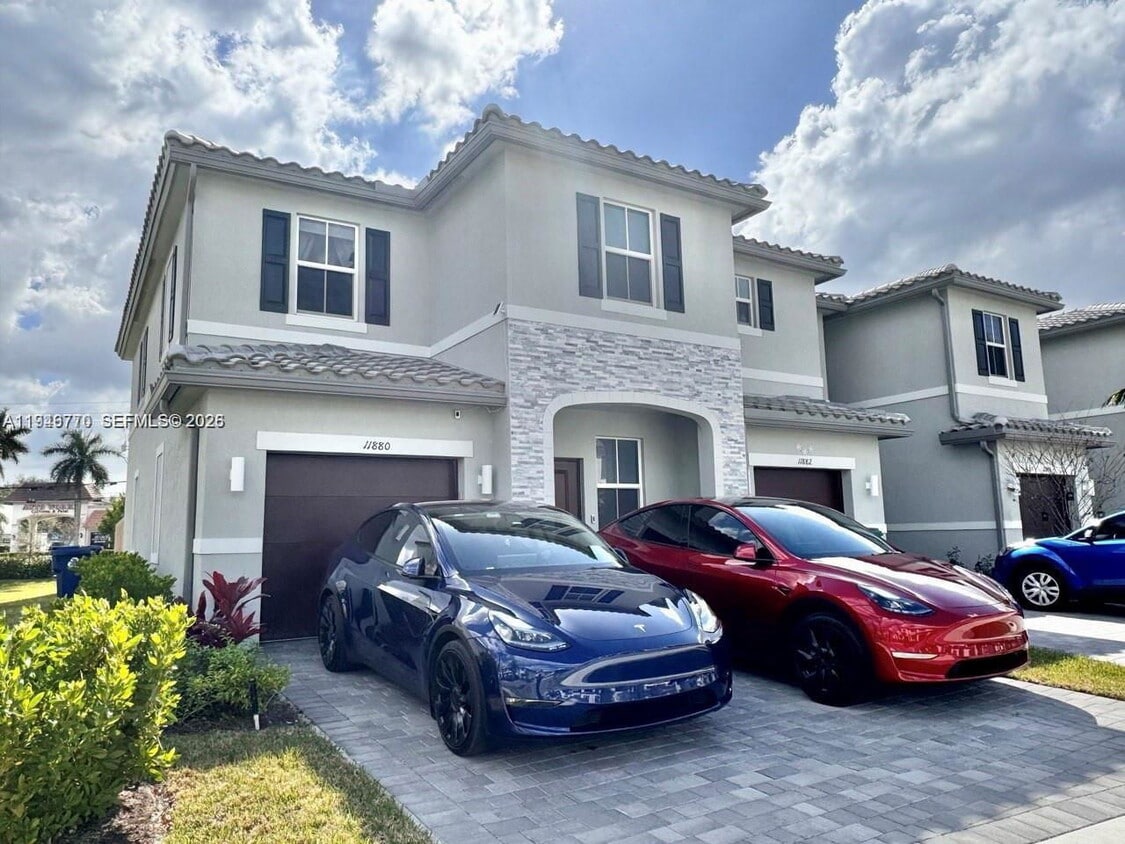 Photo - 11880 Northwest 46th Street, Coral Springs, FL 33076 - 4 BR 3 BA townhouse